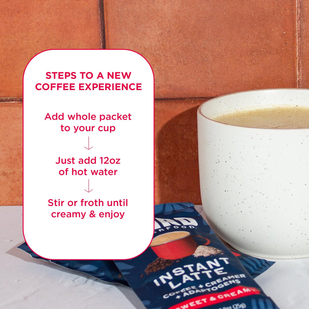 Laird Superfood Instant Latte cup beside a mug, ready to enjoy.