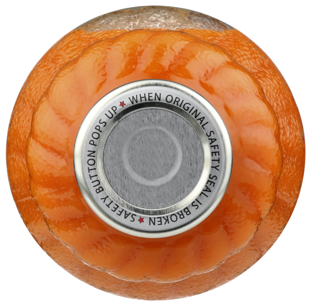 Lakewood organic carrot-ginger-turmeric juice on breakfast spread for convenient nutrition.