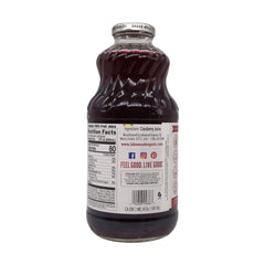 Lakewood Cranberry Juice being poured into a glass for a tart refreshment