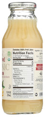Pouring Lakewood Lemon Pure Organic juice into a glass for beverages.