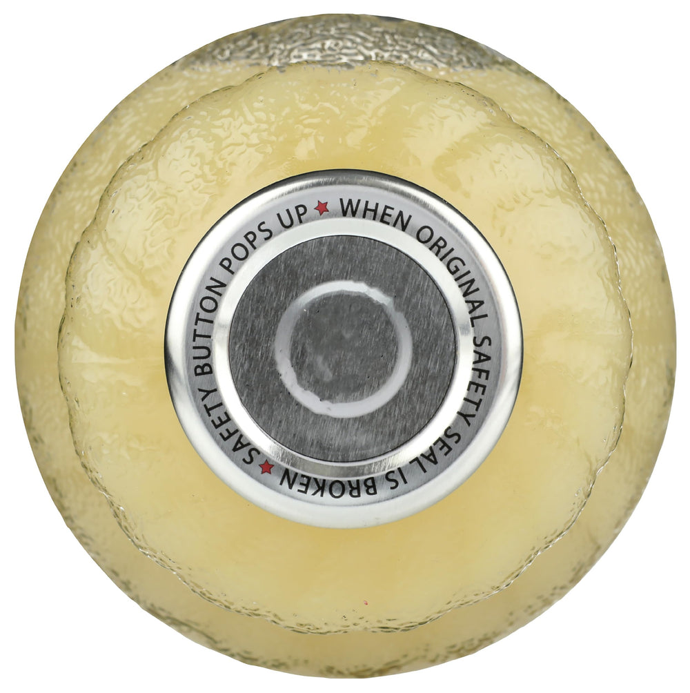 Lakewood Organic Pure Lime beside measuring spoons for precise dressings