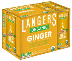Langers Ginger sparkling water bottle being poured for zero-calorie refreshment.