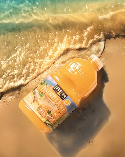 Langers Pineapple Juice glass served cold delivers refreshing hydration and flavor.