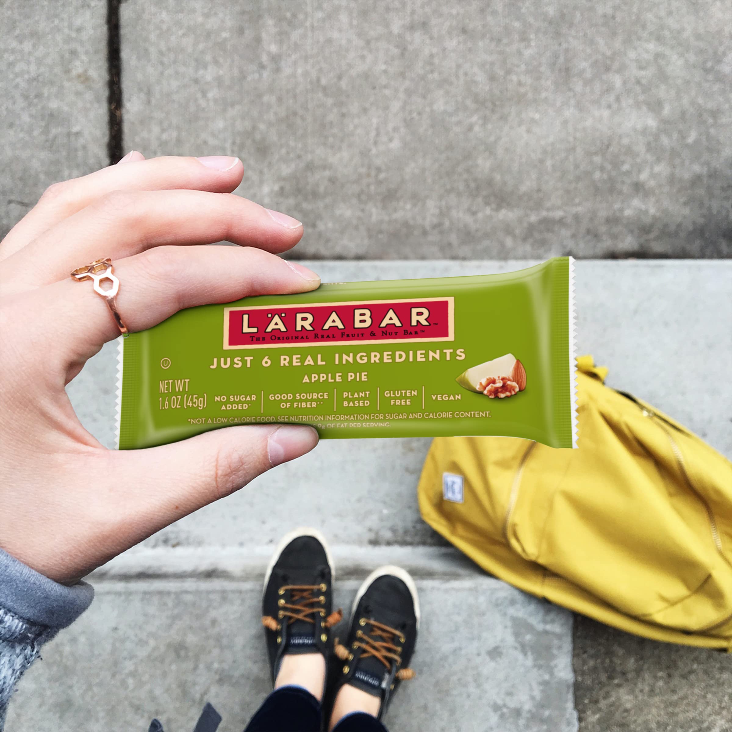 LÄRABAR Apple Pie bar cross-section reveals chewy texture from dried fruits and nuts.