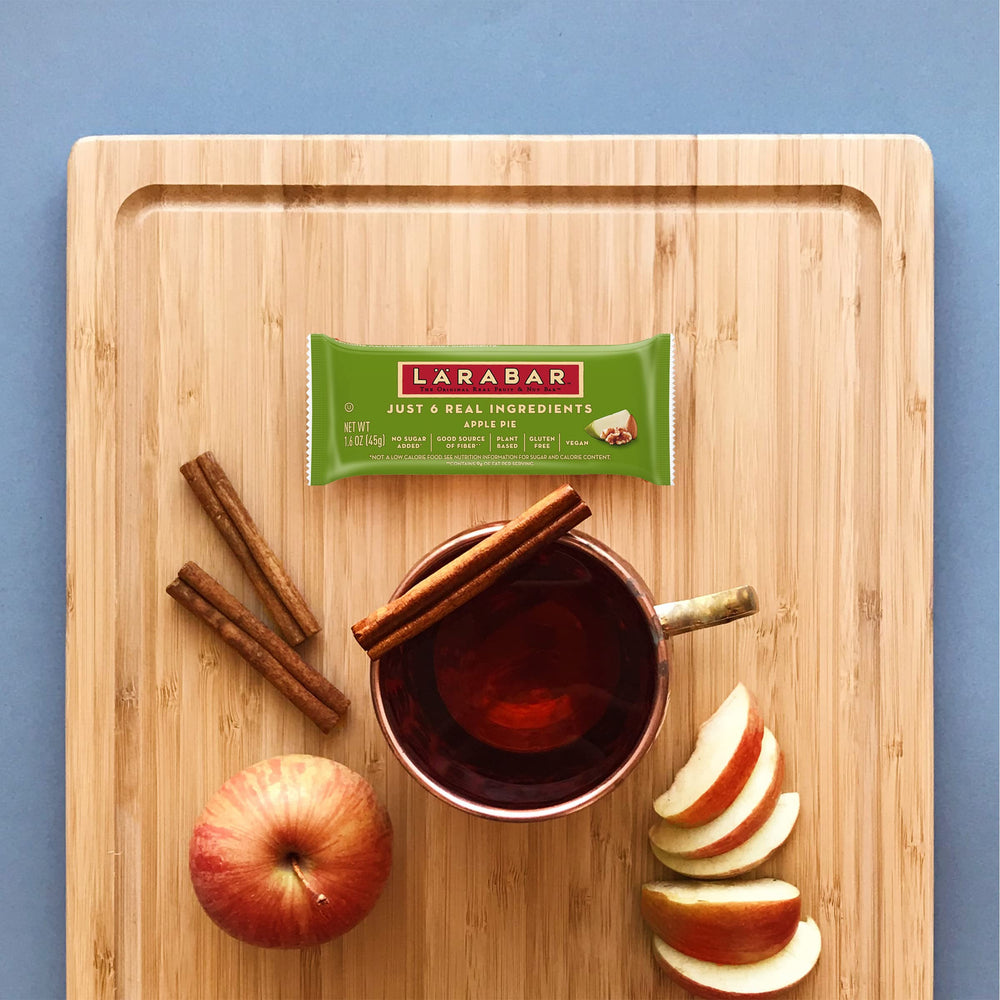 LÄRABAR Apple Pie bar bite showcasing cinnamon specks and soft fruit-nut interior.