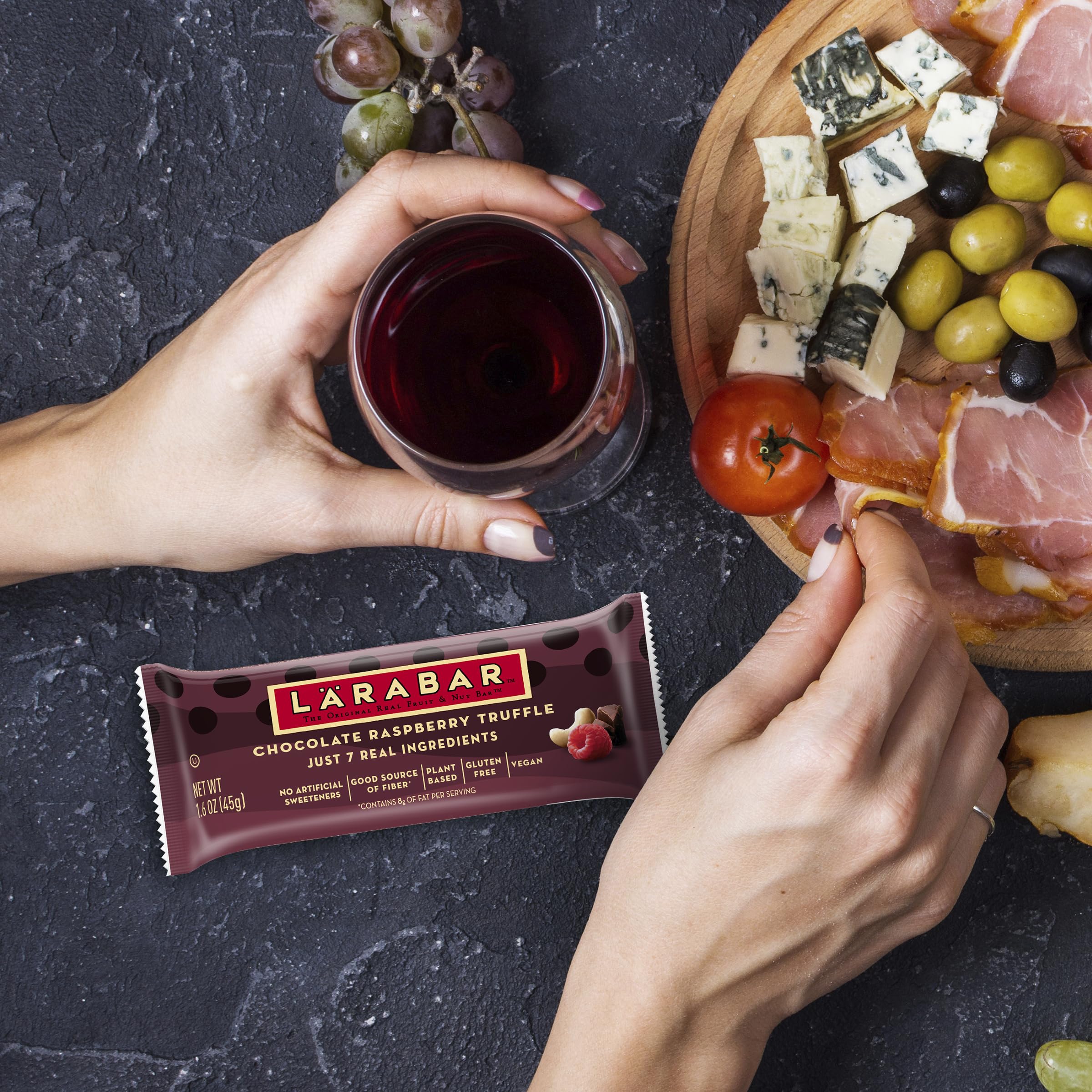 Larabar Chocolate Raspberry Truffle packaging in a lunchbox for convenient snacking.