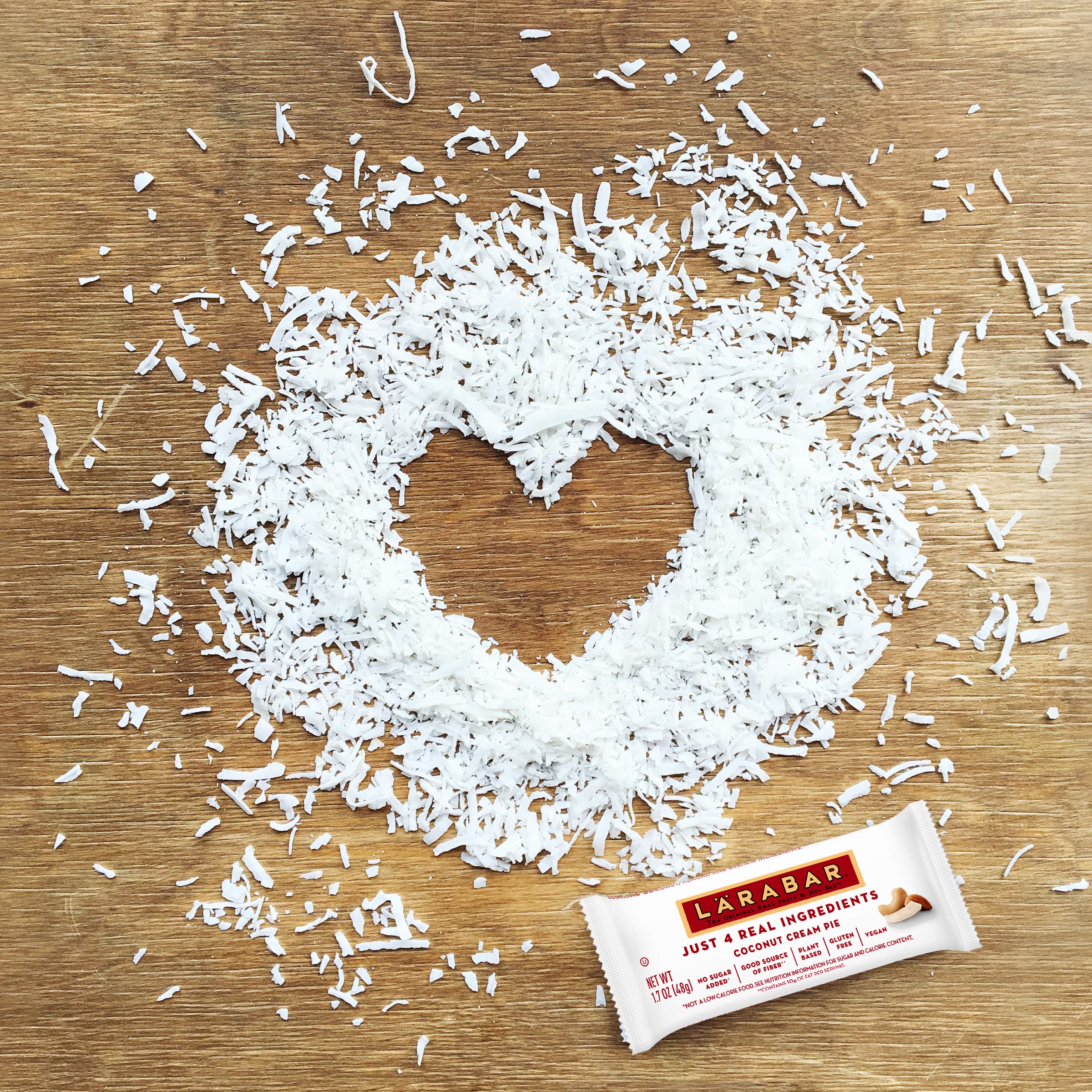 Larabar Coconut Cream Pie bar bite illustrating creamy coconut texture.
