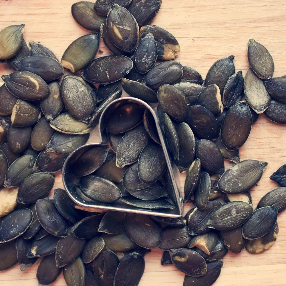 Sprouted pumpkin seeds sprinkled on a fresh salad with Lark Ellen Farm.
