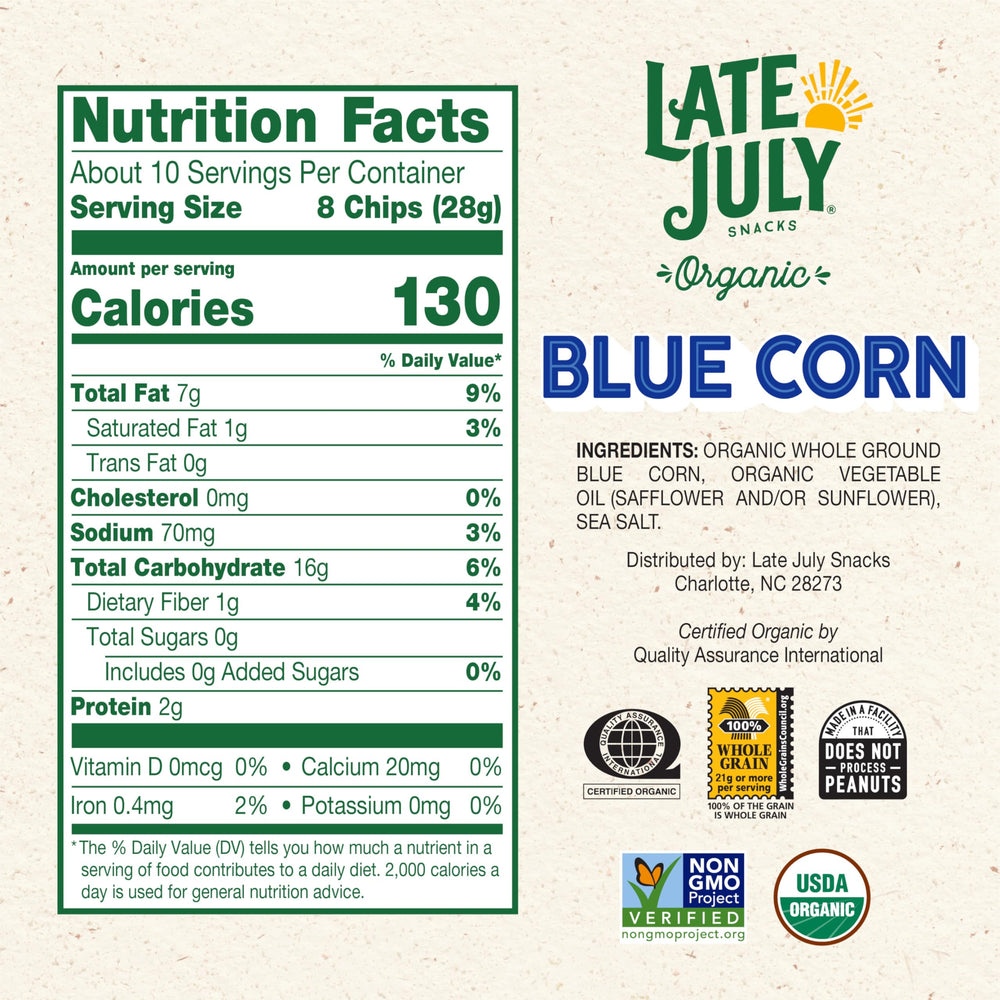 Late July blue corn tortilla chips crisp closeup, thin melt-in-your-mouth texture.