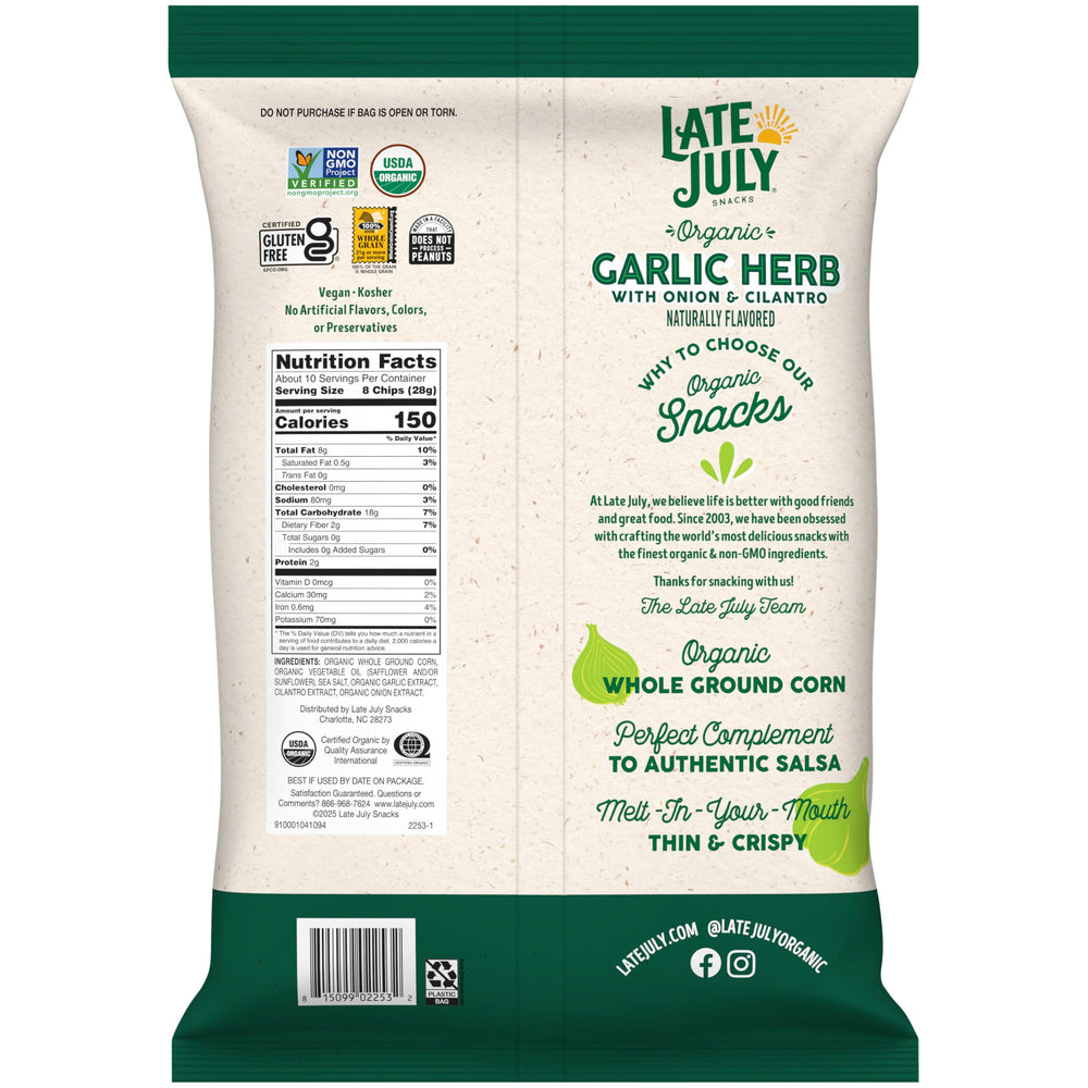 Chips with salsa for dipping featuring Late July Garlic Herb Tortilla Chips.