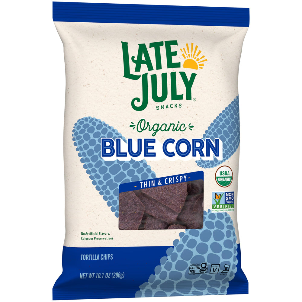 Late July blue corn chips on a party plate, ready for dipping.