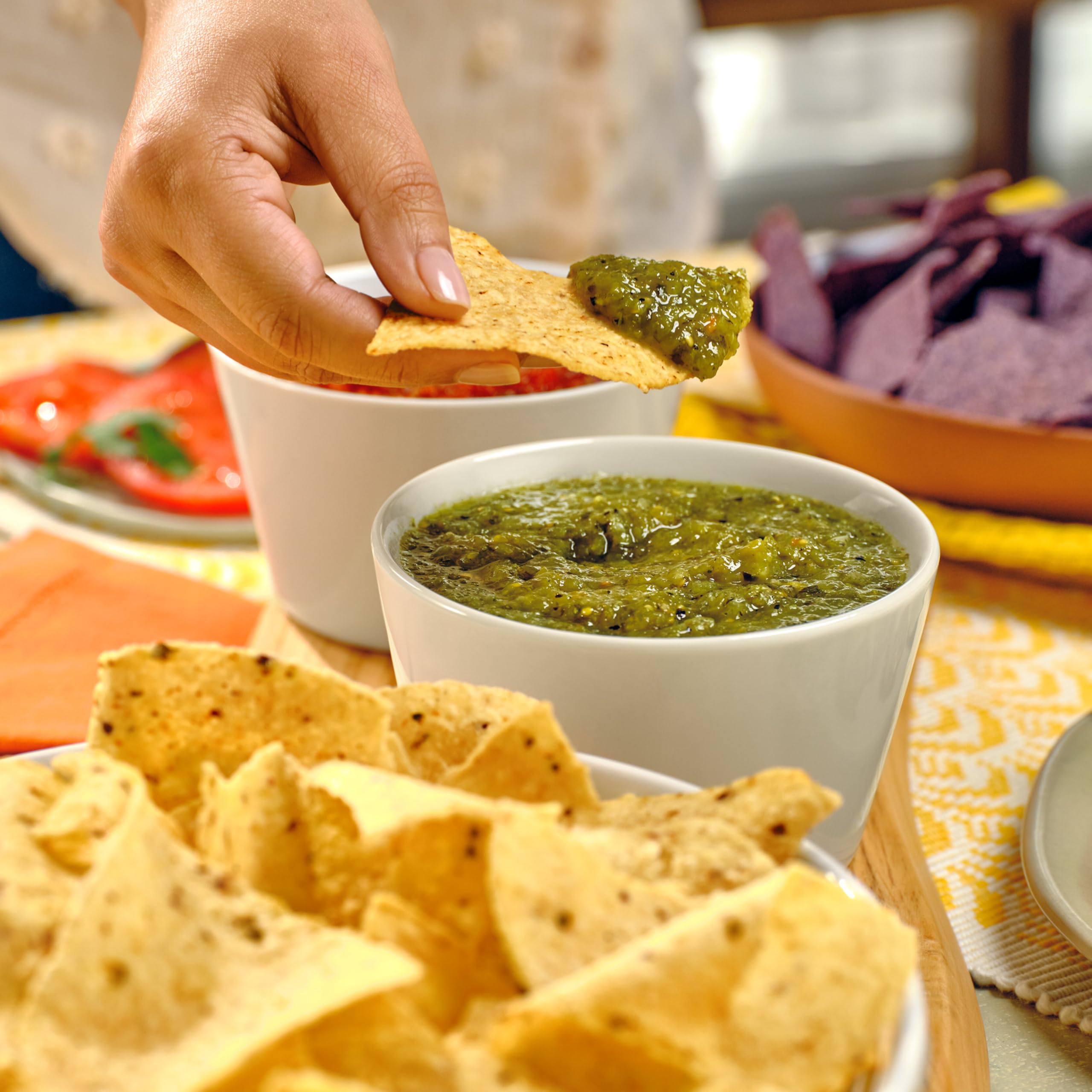 Late July Salsa Verde jar beside serving size for sharing at gatherings