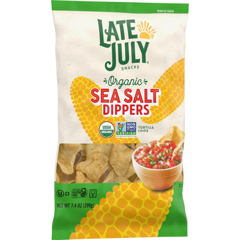 Dipping guacamole with Late July Sea Salt Dippers for a snack