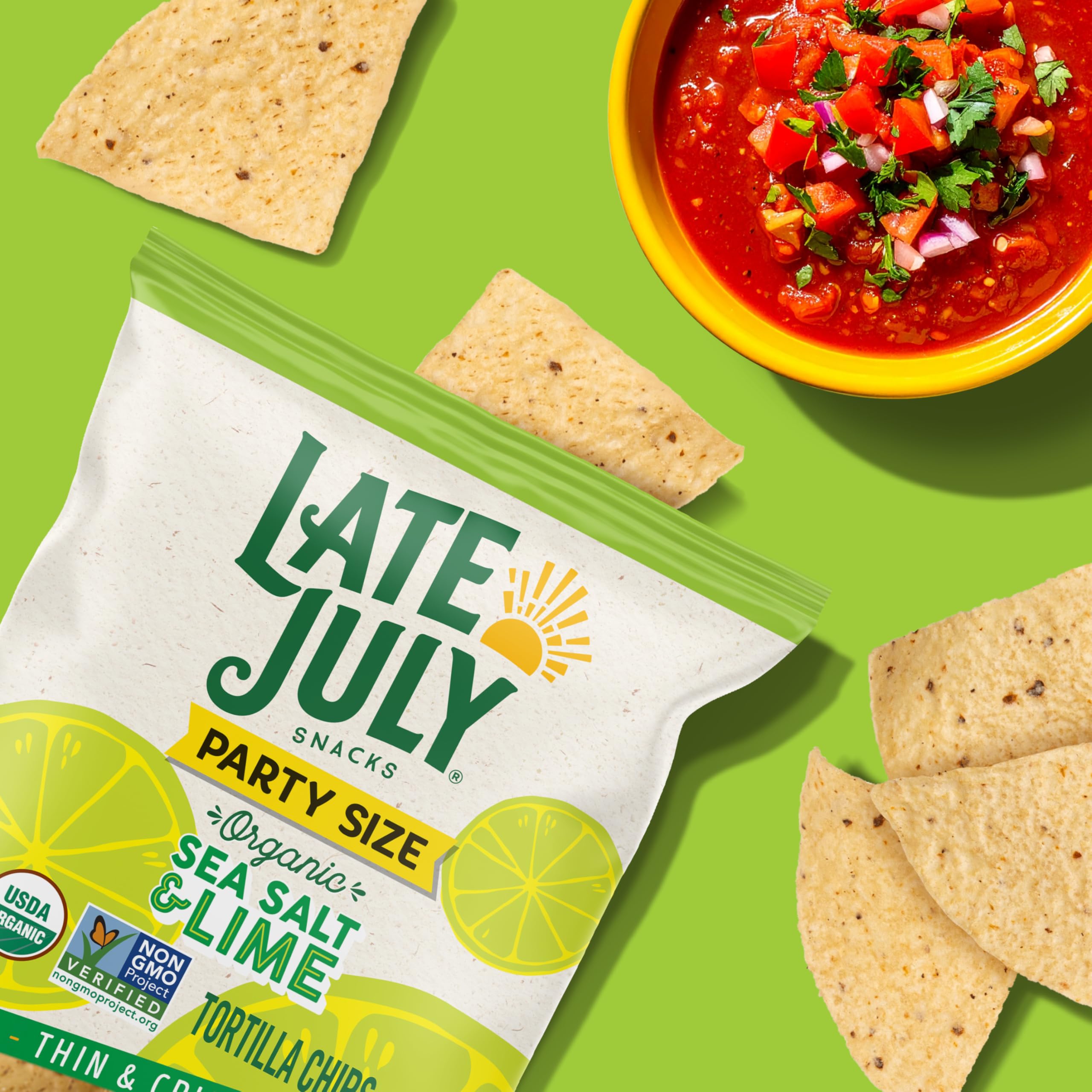 Late July Sea Salt & Lime chips in a bowl with salsa.