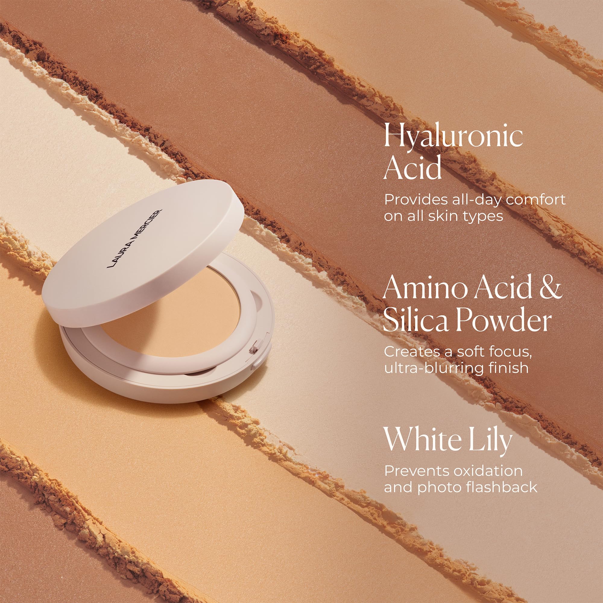 Laura Mercier powder delivers a natural soft-matte finish on model.
