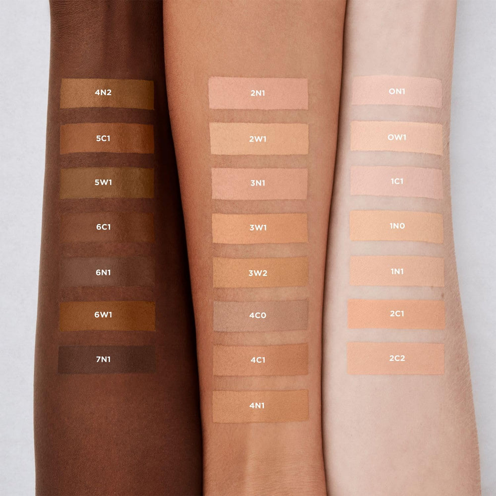 Swatches of Laura Mercier Real Flawless serum concealer on skin showing natural shade match.