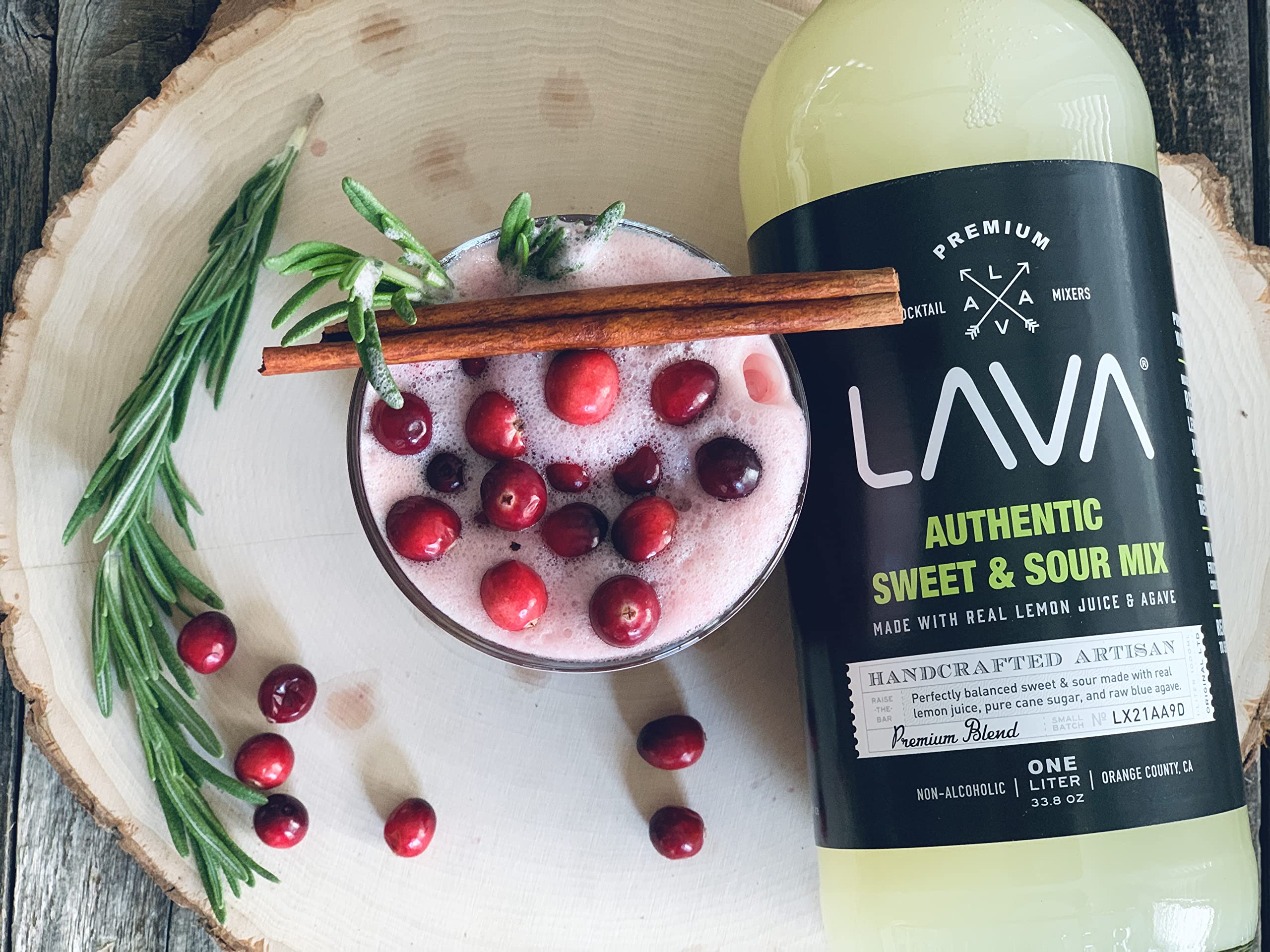 LAVA Sweet & Sour Mix cocktail setup pairs with whiskey and margaritas for versatile mixing.