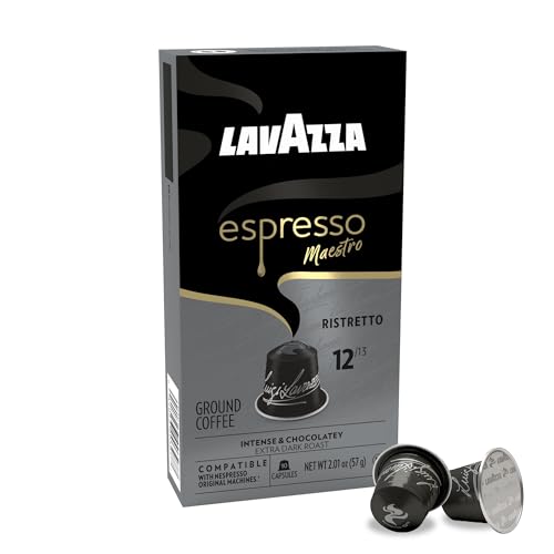 Close-up of Lavazza Maestro Ristretto capsules being poured into a machine.