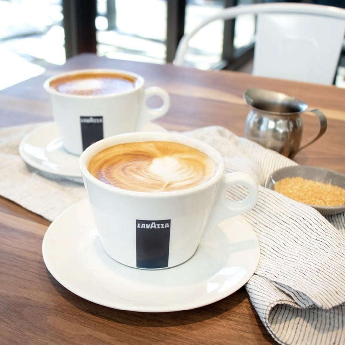 Lavazza Qualità Oro aroma notes fruity nutty; sensory-rich experience for mornings.