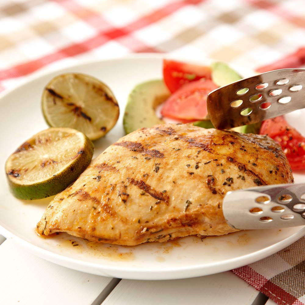 Seasoning fish with Lawry's Casero for quick, savory finish.