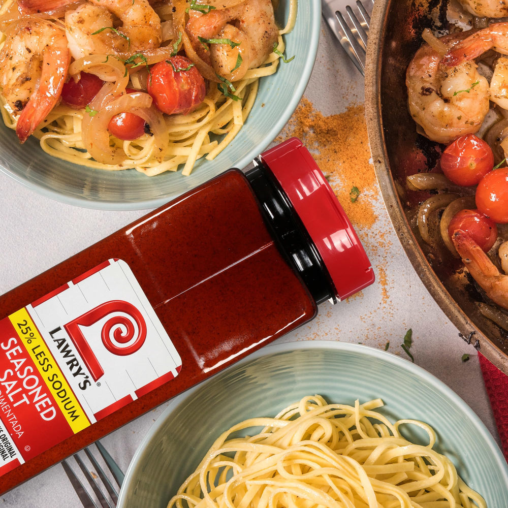 Lawry's cooking application with salt-dusting over vegetables