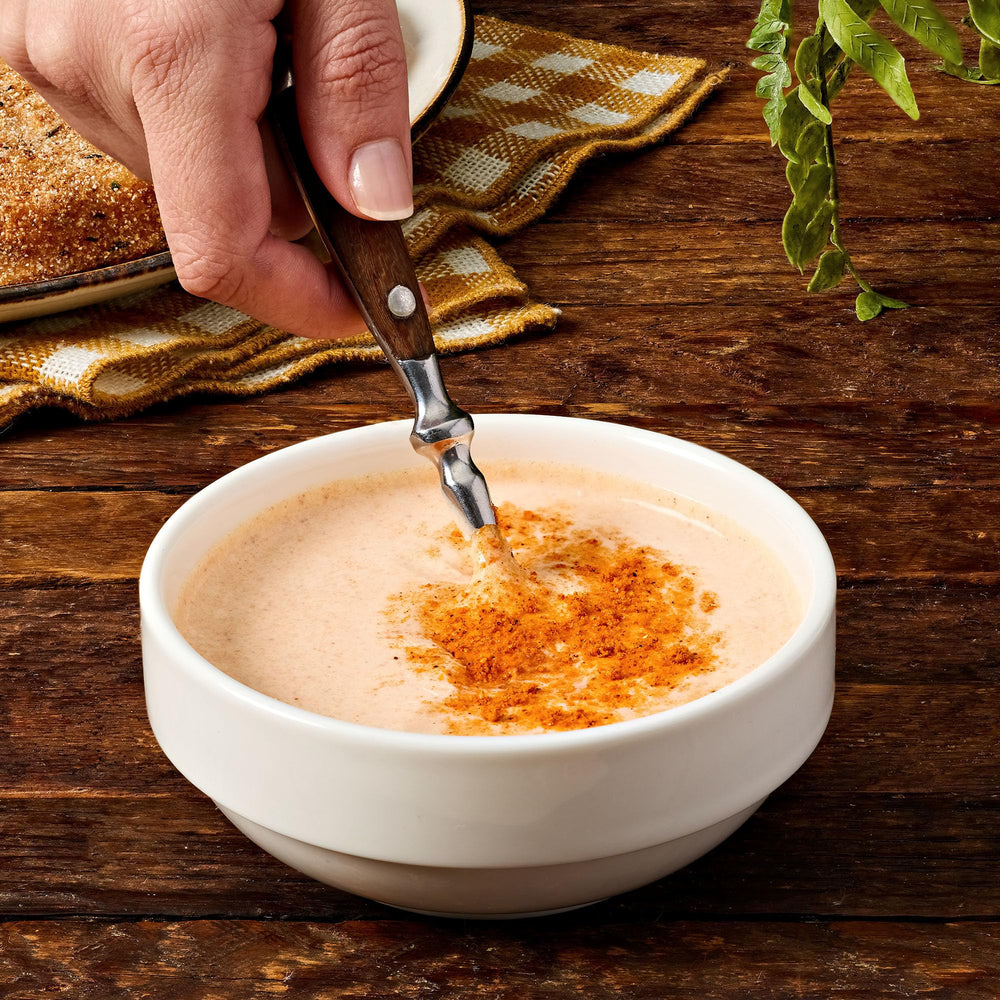 Lawry's Fry Seasoning spice mix in a bowl for easy seasoning.