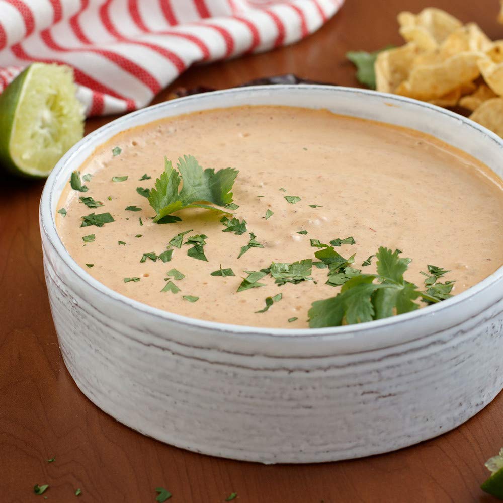 Lawry's powder dusting on meat for enhanced aroma and savory crust.