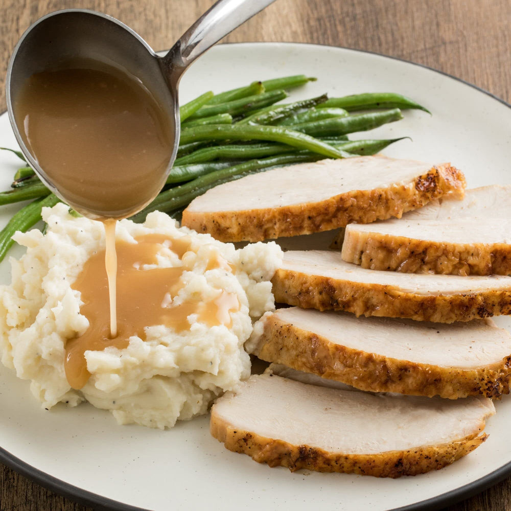 Pour shot of Lawry's Perfect Blend for easy sprinkling on meats