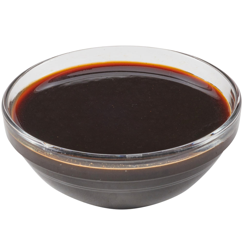 Lawry's Teriyaki Marinade pantry-bottle on kitchen counter ready to marinate.