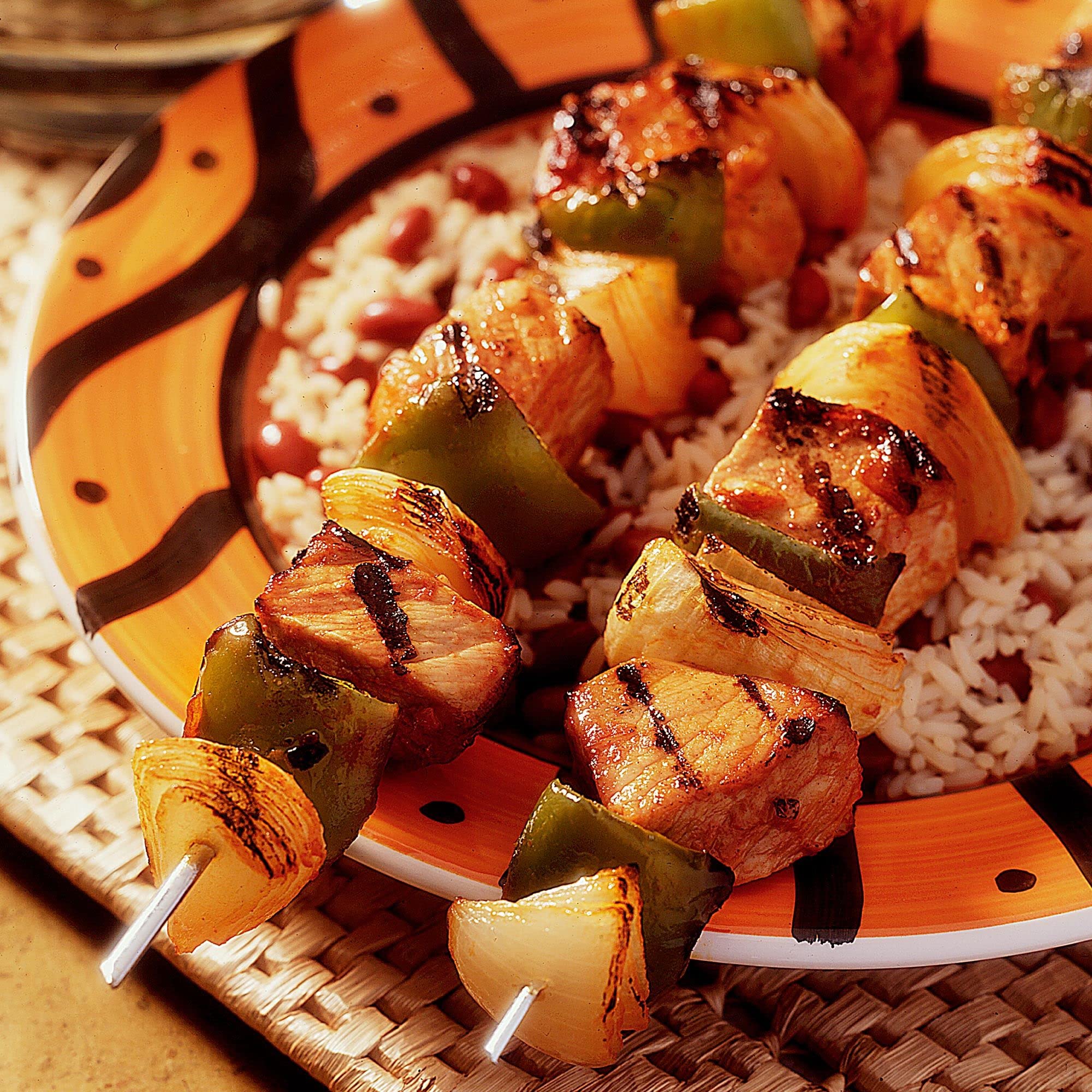 Lawry's Teriyaki Marinade pineapple-glaze on seafood suggests bright, tropical flavor notes.