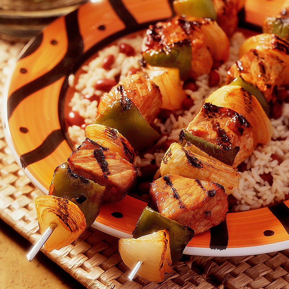 Lawry's Teriyaki Marinade pineapple-glaze on seafood suggests bright, tropical flavor notes.