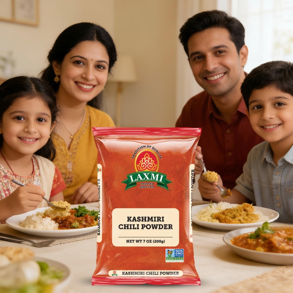 LAXMI Kashmiri chili powder front-packaging indicates non-GMO and mild heat.