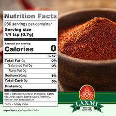LAXMI Kashmiri chili powder pours from a spoon, ready for quick meals.