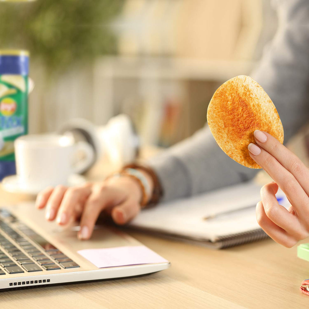 Lay's Stax potato crisp texture closeup highlighting crunch.