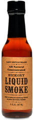 Lazy Kettle Liquid Smoke bottle pour adds authentic hickory flavor to smoked meats.