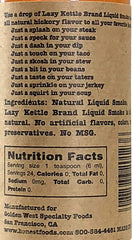 Lazy Kettle Liquid Smoke hickory essence enhances grilled dishes with bold smoky notes.