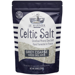 Le Marinier Celtic salt bottle close-up shows gray crystals ideal for finishing seafood.