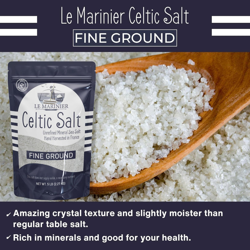 Hand-harvest scene of Le Marinier Celtic Salt in French marshes