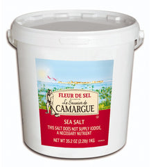 Le Saunier De Camargue Fleur de Sel salt bottle with cork top for elegant presentation.
