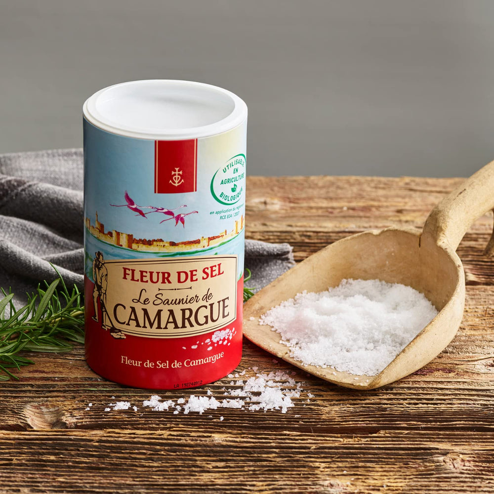 Close-up of Le Saunier De Camargue fleur de sel crystals, showing delicate flakes.