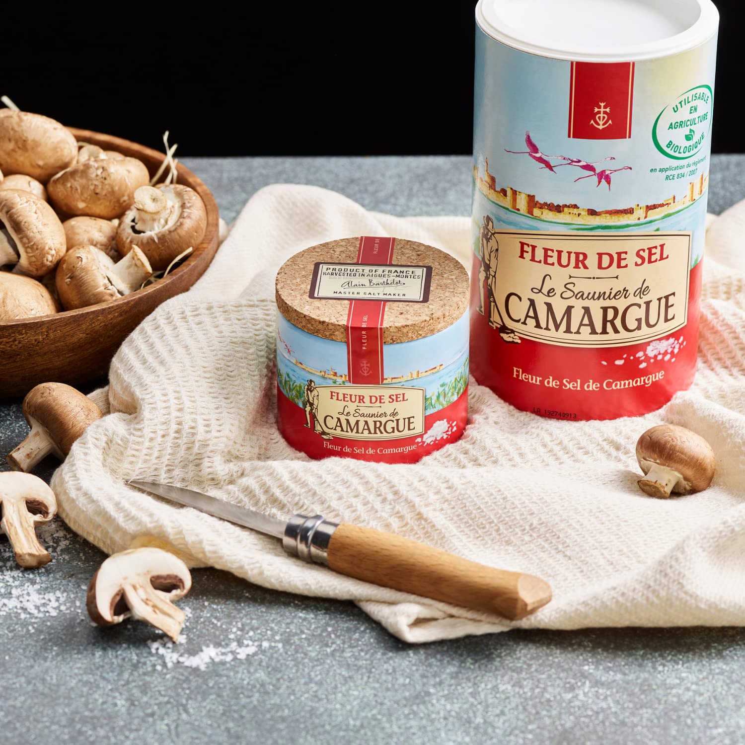 Le Saunier De Camargue fleur de sel poured over a dish for finishing touch.