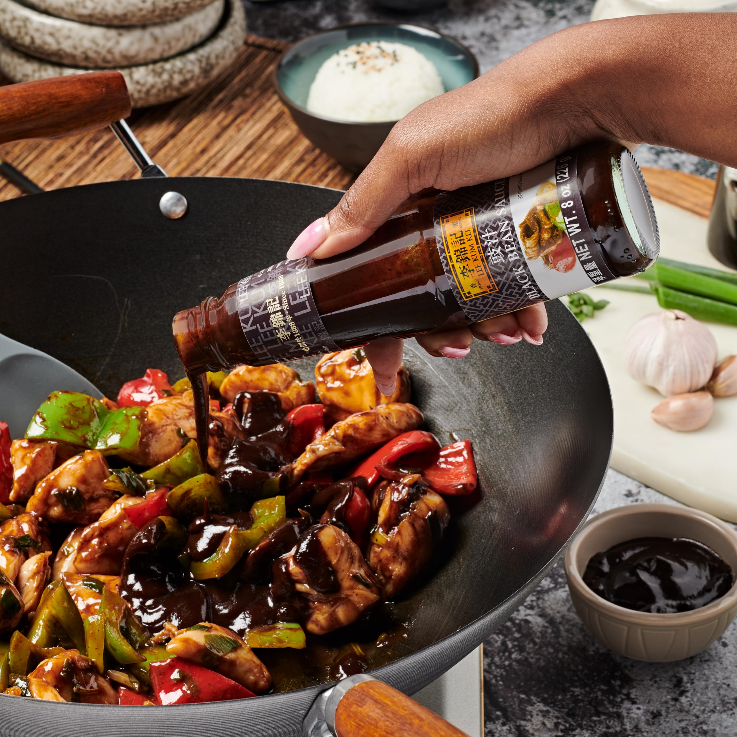 Lee Kum Kee Black Bean Sauce with noodles for quick, savory dishes.