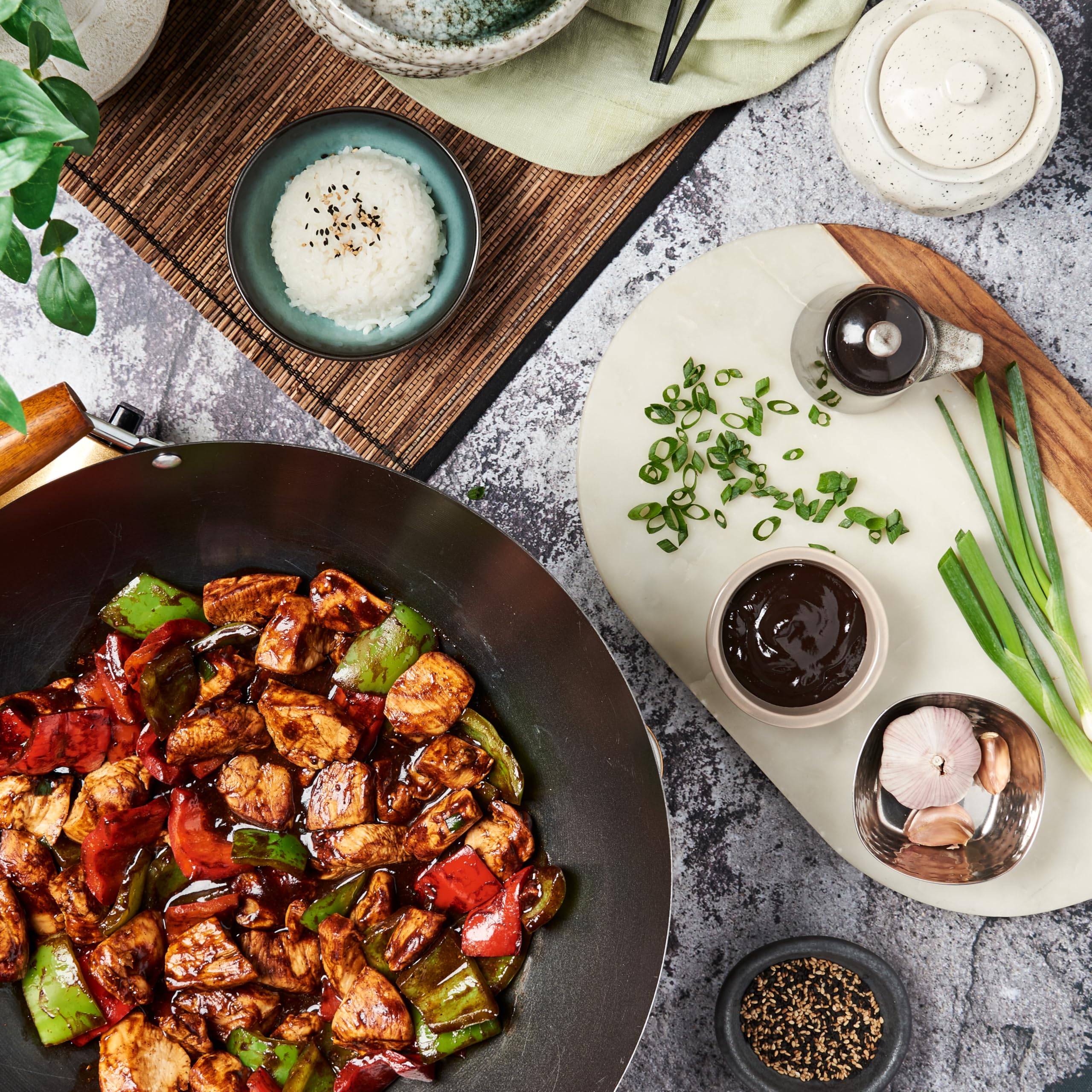 Lee Kum Kee Black Bean Sauce over steamed rice enhances daily meals.