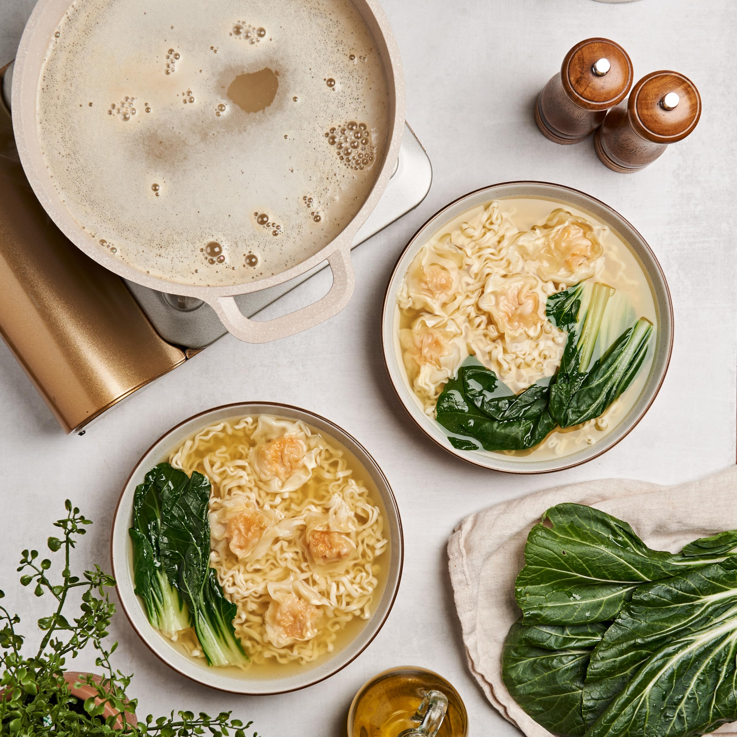 Lee Kum Kee Bouillon powder blending into creamy sauces and stews.