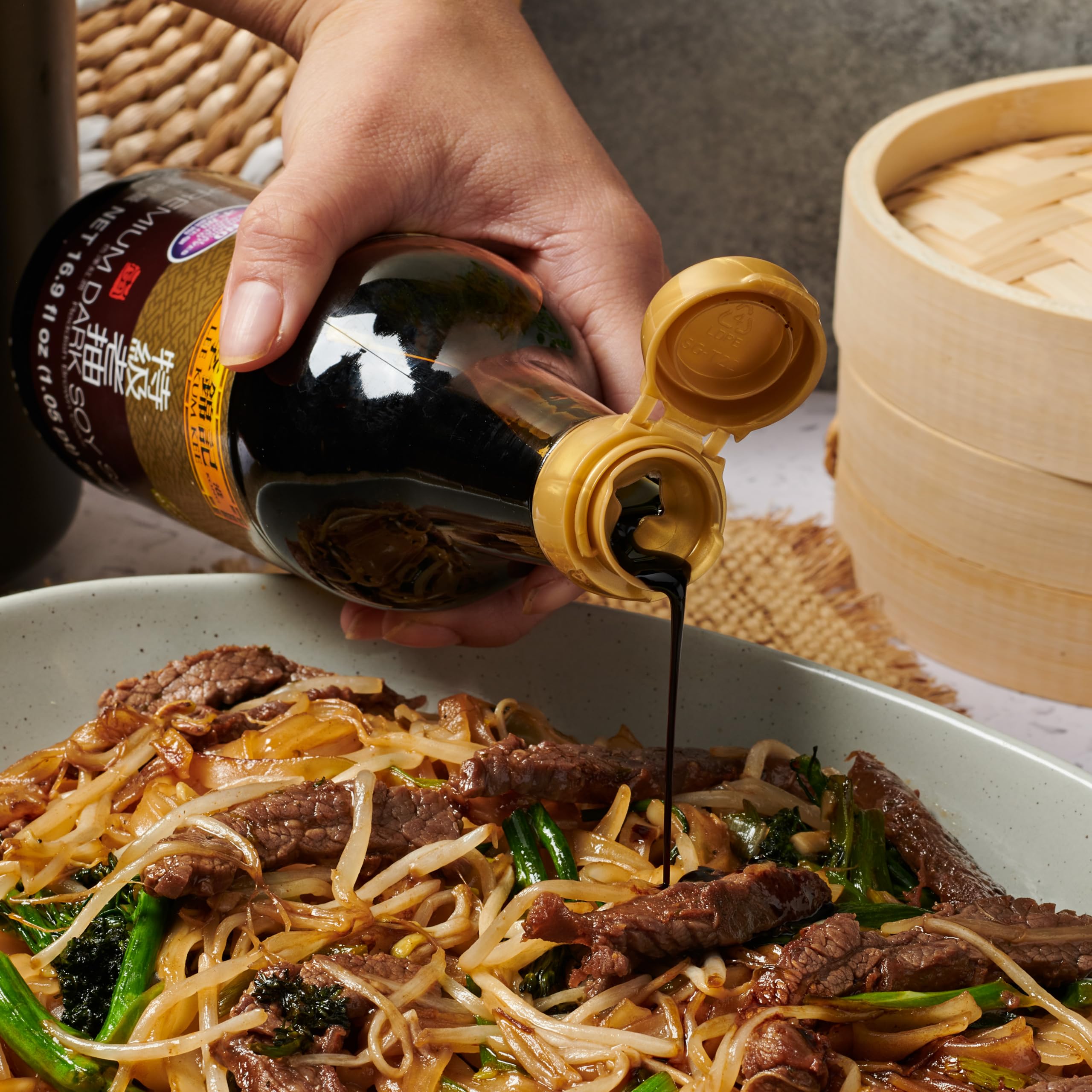 Lee Kum Kee Premium Dark Soy Sauce reduces a sauce for depth.
