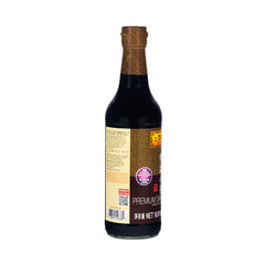 Pour-ready Lee Kum Kee Premium Dark Soy Sauce bottle highlights glossy finish and deep umami hue