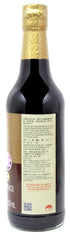 Lee Kum Kee Premium Dark Soy Sauce over a stir-fry, adding color and depth.