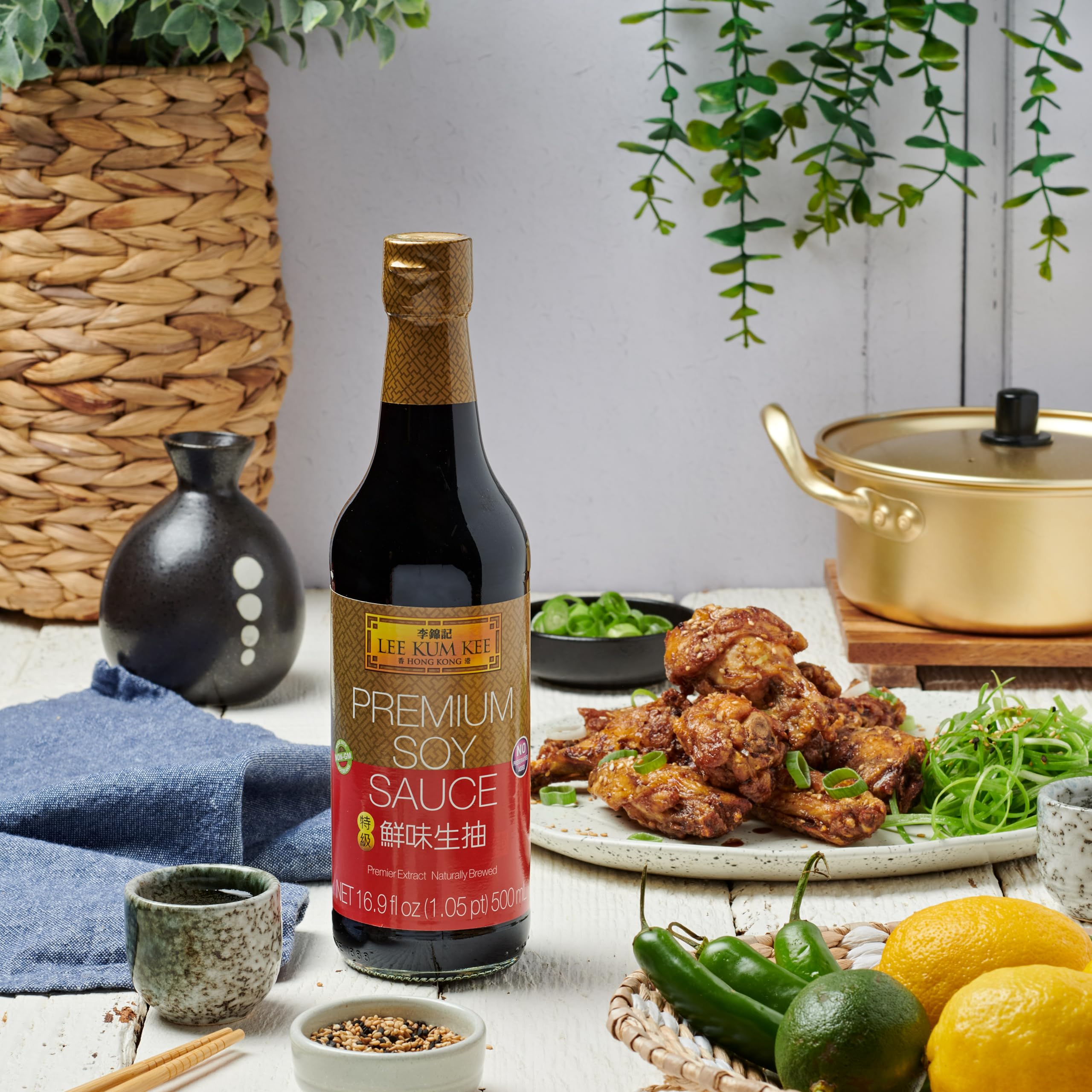 Close-up pour of Lee Kum Kee Premium Light Soy Sauce over vegetables for savory flavor