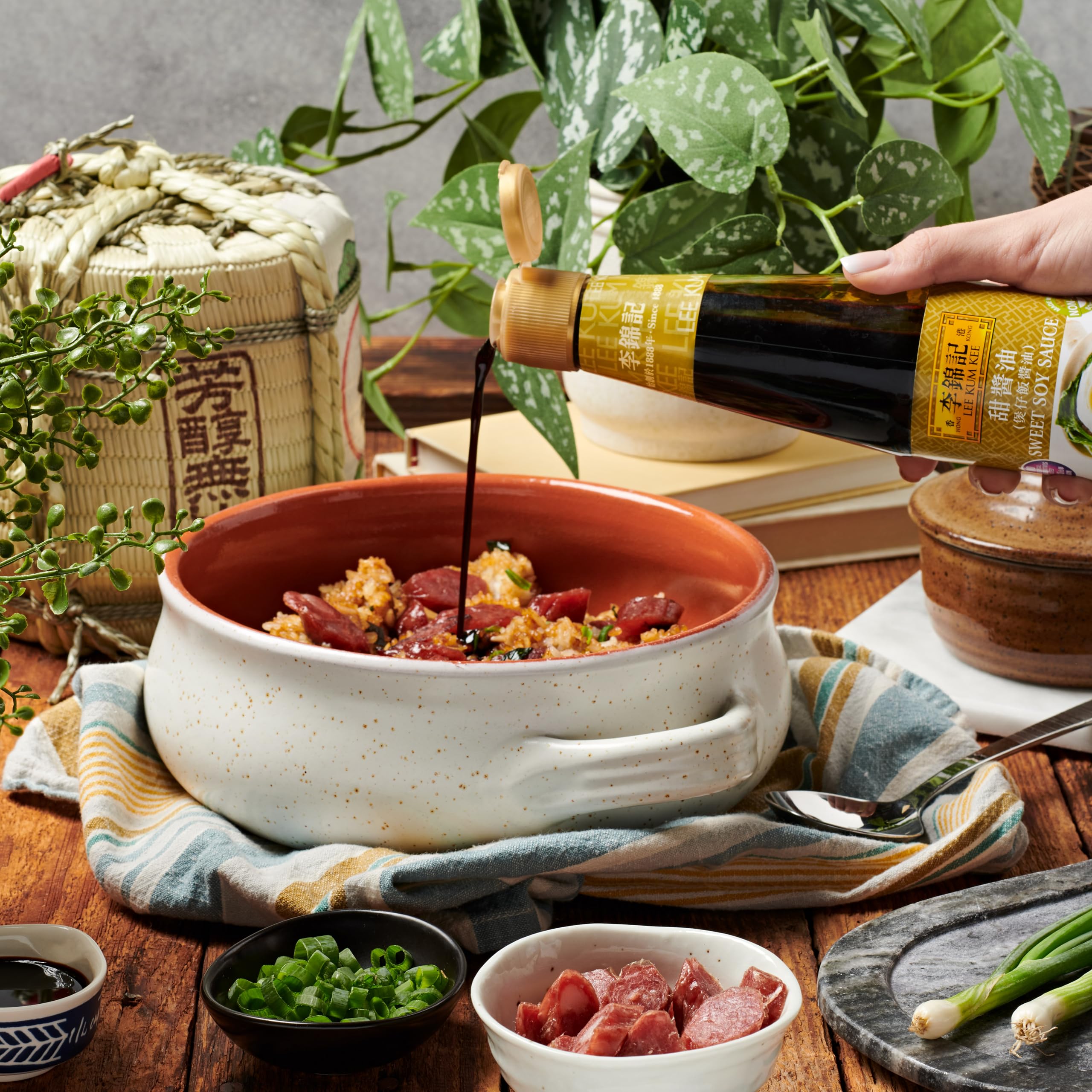 Lee Kum Kee Sweet Soy Sauce enriches clay pot rice with richness.