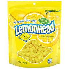 Lemonhead hard lemon candy round close-up with crisp crunch and bright citrus